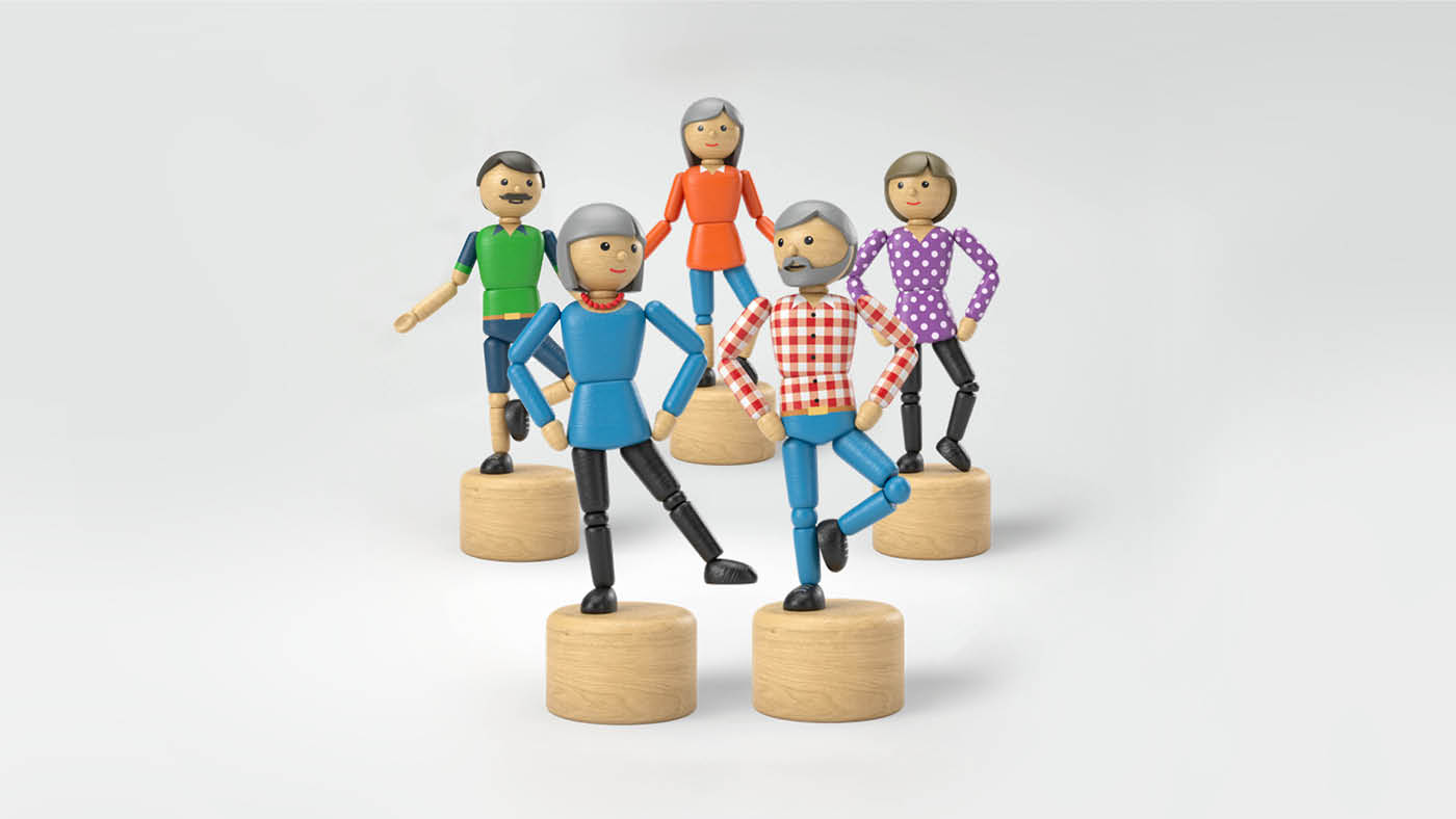 Cinq figurines en bois censées représenter des personnes qui  bougent.
